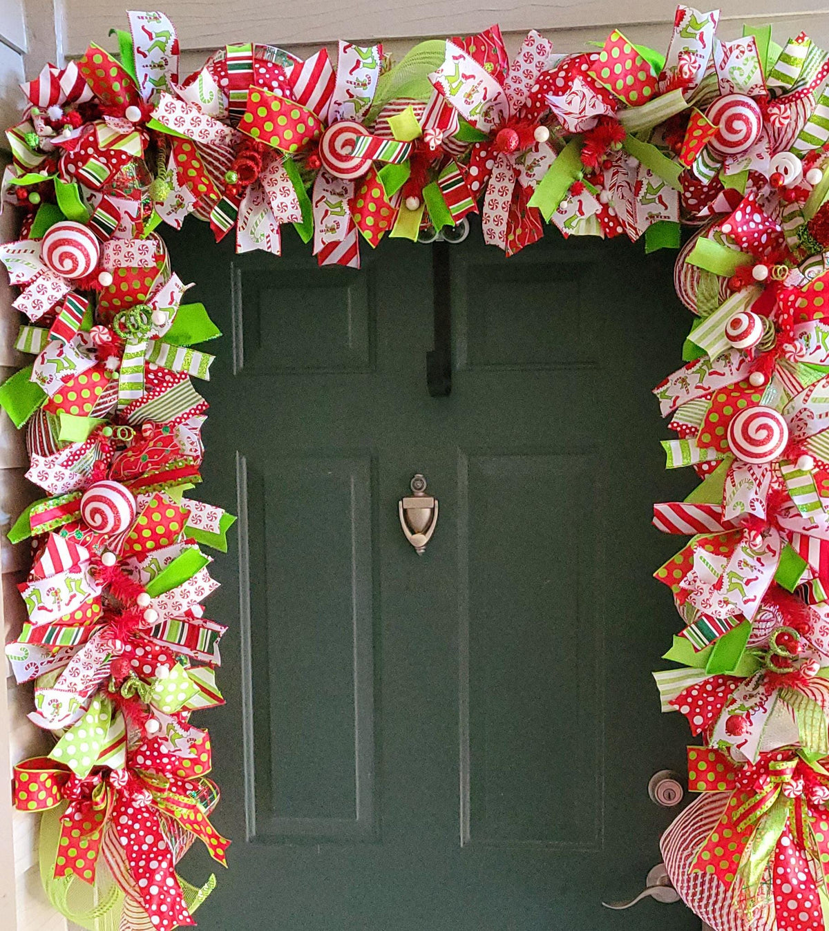 Whimsical christmas garland, grinchy green monster mantle decoration, red and green mean one swag